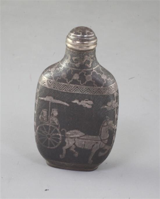 A Chinese iron and silver inlaid snuff bottle, late 19th/early 20th century, 7.3cm including stopper (no. 795)